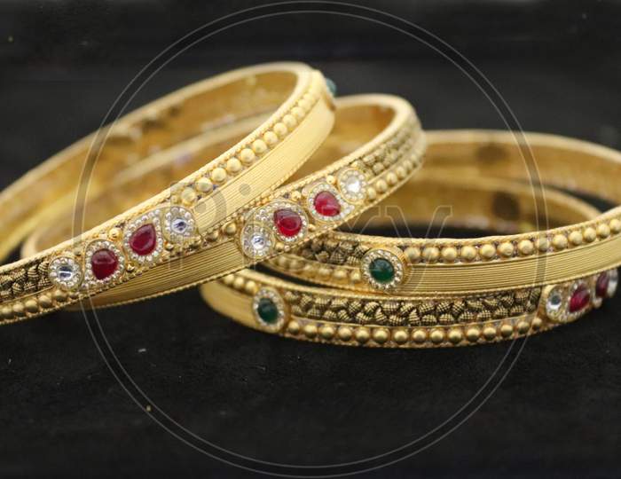 Two Bangles Or Kadas Or Kangan Places On A Surface Being Focused