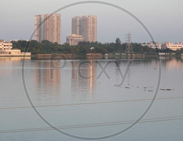 Beautiful Modern High Rise Buildings Across The Lake Are Built In Chennai City Of India.