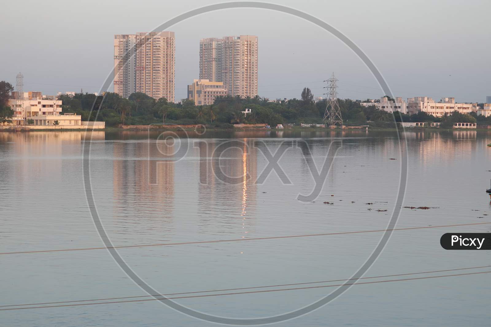 Beautiful Modern High Rise Buildings Across The Lake Are Built In Chennai City Of India.