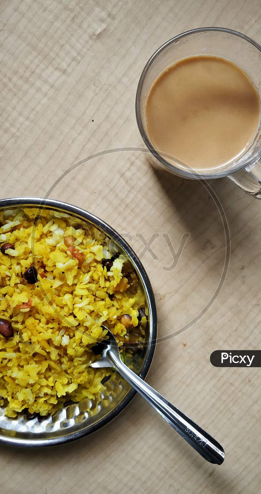 Indian breakfast Chai and Poha