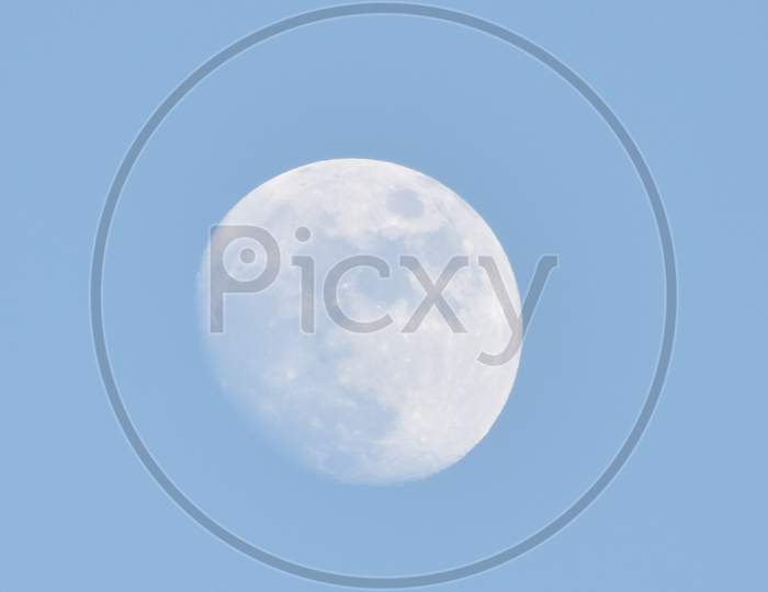 A daytime moon in the sky