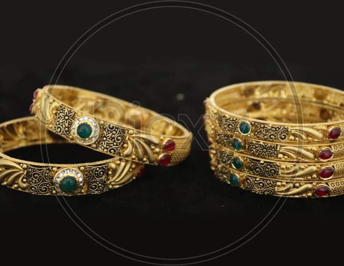 Two Bangles Or Kadas Or Kangan Places On A Surface Being Focused