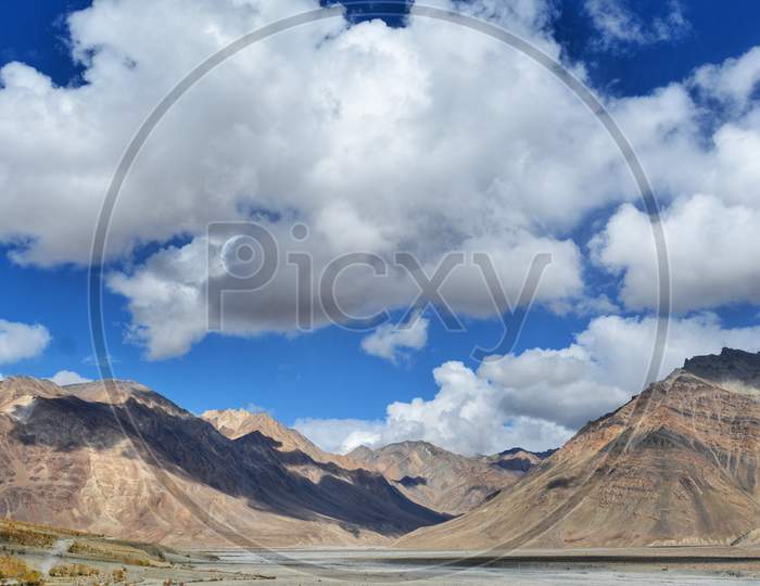 Landscapes of Spiti valley with white clouds on a sunny day