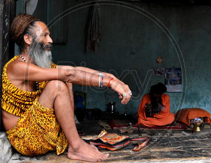 A Hindu monk sitting at a temple at Manali