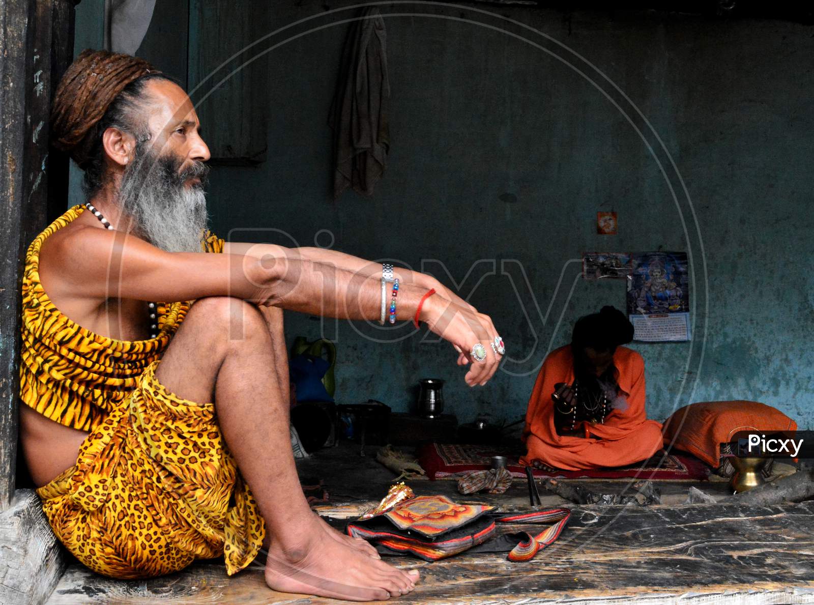 A Hindu monk sitting at a temple at Manali