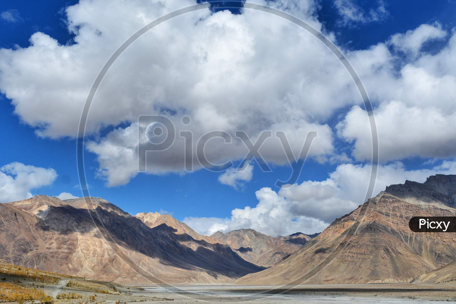 Landscapes of Spiti valley with white clouds on a sunny day
