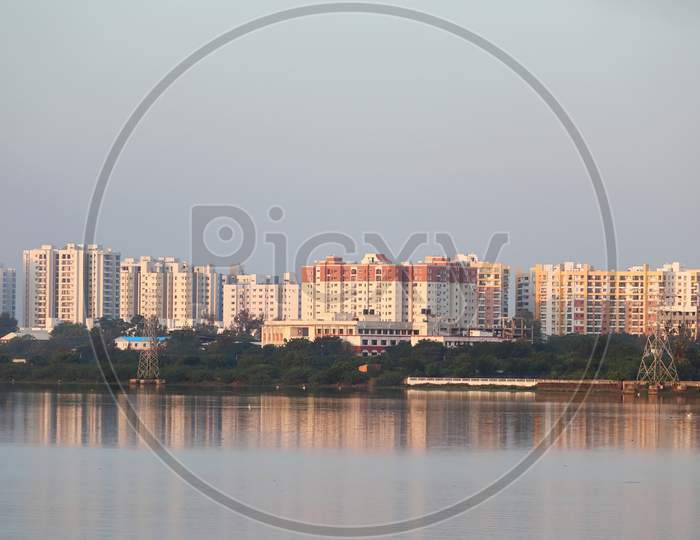 Gorgeous Buildings With New And Modern Technology Built Near The Lake, City Landscape