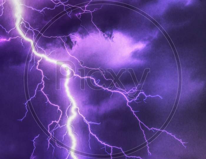Lightning in the sky-Purple coloured lightning in the sky-lightning, storm, thunder, electricity, sky, bolt, electric,purple flash, weather, thunderstorm, night, abstract, light, rain, strike, energy, nature, cloudy day