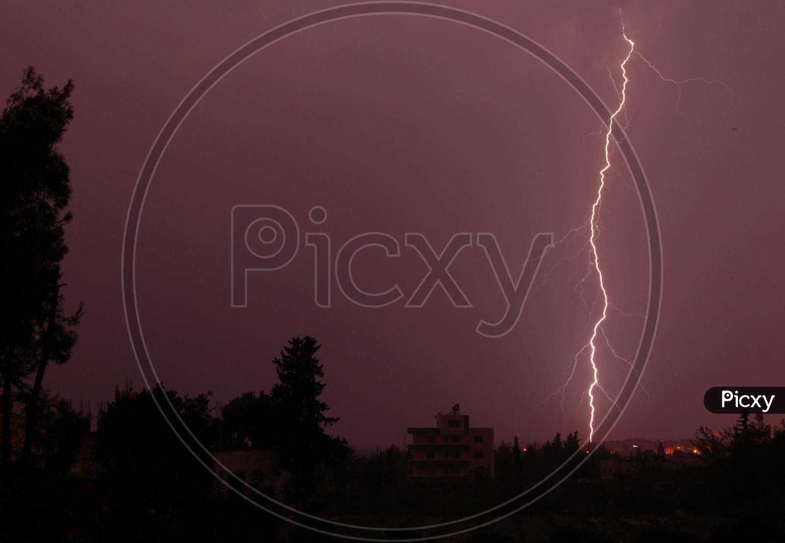 Lightning in the city-Purple coloured lightning in the sky-lightning, storm, thunder, electricity, sky, bolt, electric,purple flash, weather, thunderstorm, night, abstract, light, rain, strike, energy, nature, cloudy day