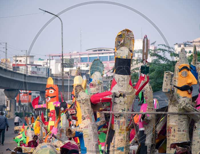 Street Road Side Artisans Workers Labor Craftsment Working On Multiple Paper Effigy Statues Of Ravan The Demon King Who Is Burnt On The Hindu Festival Of Dussera As Foretold In The Ramayana.