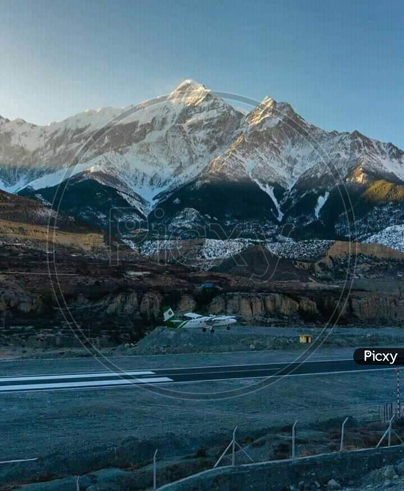 Himalayan airport mountain landforms mountain range