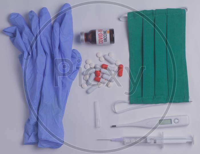 Drugs And Tablets, A Spoon And A Syringe On A Wooden Table Close-Up