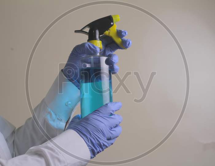 Spraying Anti-Bacterial Sanitizer Spray, Hand Sanitizer Dispenser, Infection Control Concept. Sanitizer To Prevent Colds, Virus, Coronavirus, Flu. Spray Bottle. Alcohol Spray.