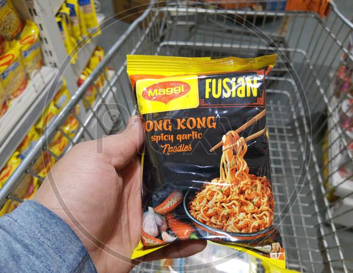 Delhi, India - October 05, 2020 : Maggi Fusian Hong Kong Spicy Garlic Noodles - 73G Pouch