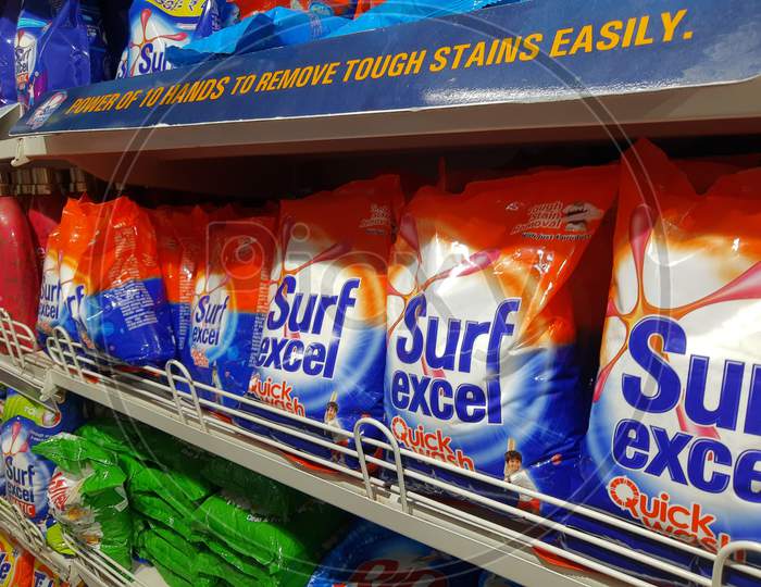 Delhi, India - October 05, 2020 : Collection Of Surf Excel In Supermarket Display Rack. Closeup Side View.