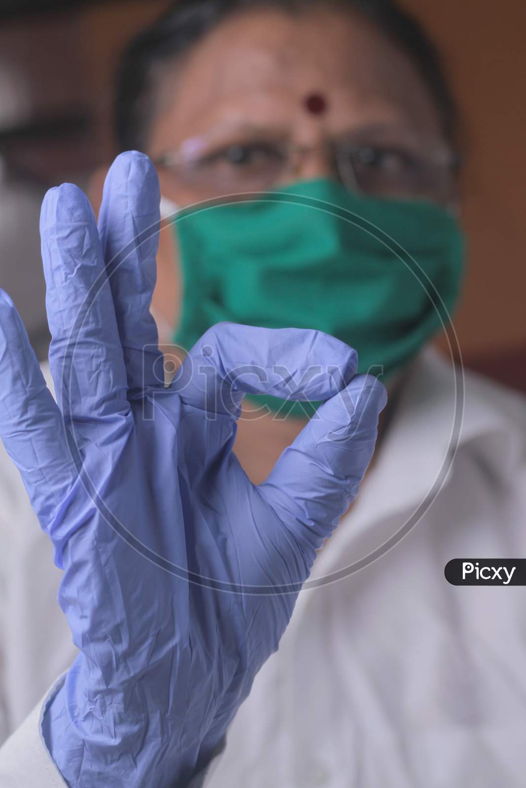 Woman Doctor Wears Medical Gloves, Medicine Concept