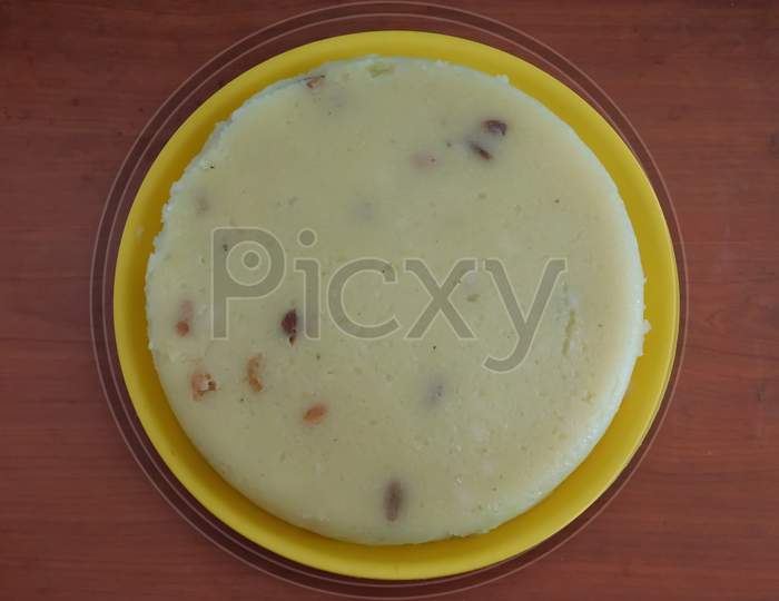 Closeup Of A Delicious Sweet Food In A Plate Isolated On Wooden Surface