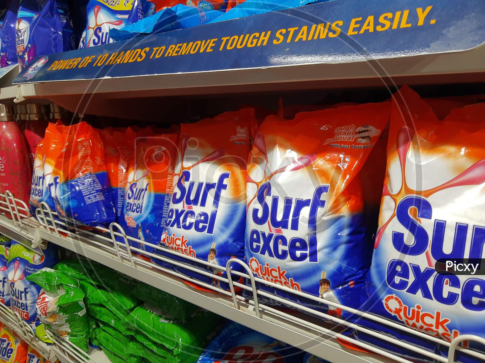 Delhi, India - October 05, 2020 : Collection Of Surf Excel In Supermarket Display Rack. Closeup Side View.