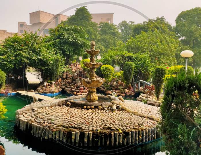 Beautifully decorated Fountain in rock garden
