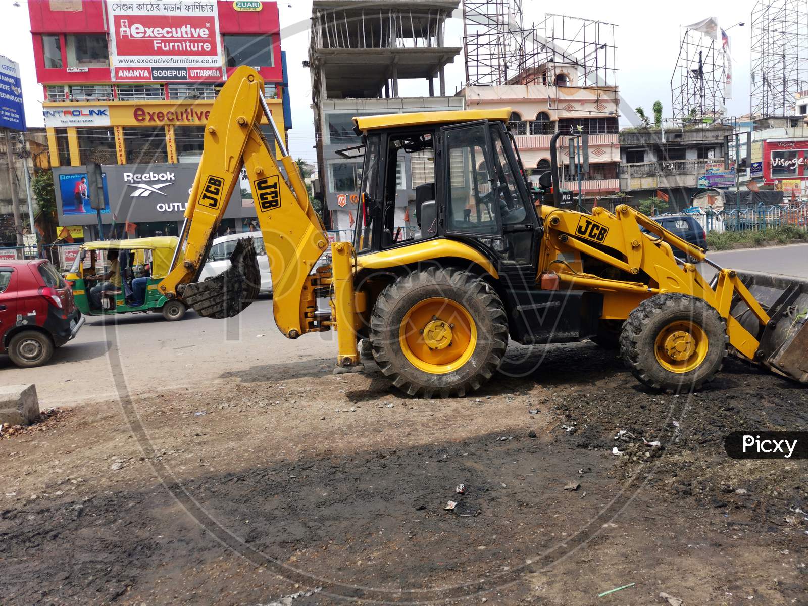Road maintenance work by earth mover equipment.