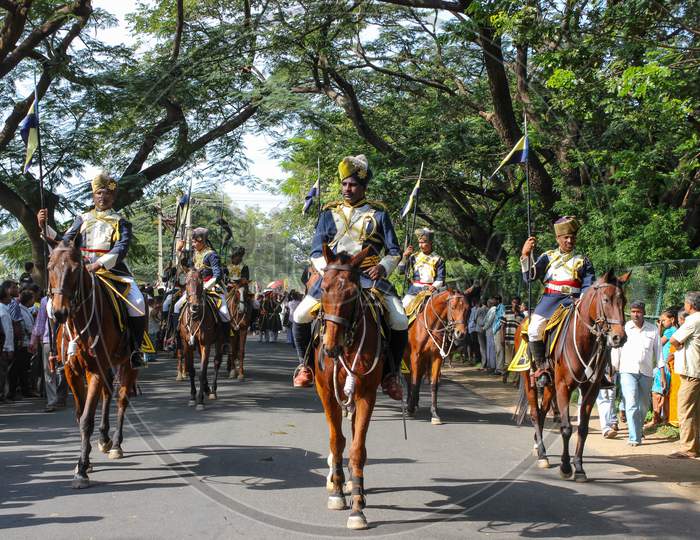 A Classic Picture of Royal Horsemen on a Procession with their Horses during a Religious ritual at Mysuru Cityscape of Karnataka/India.