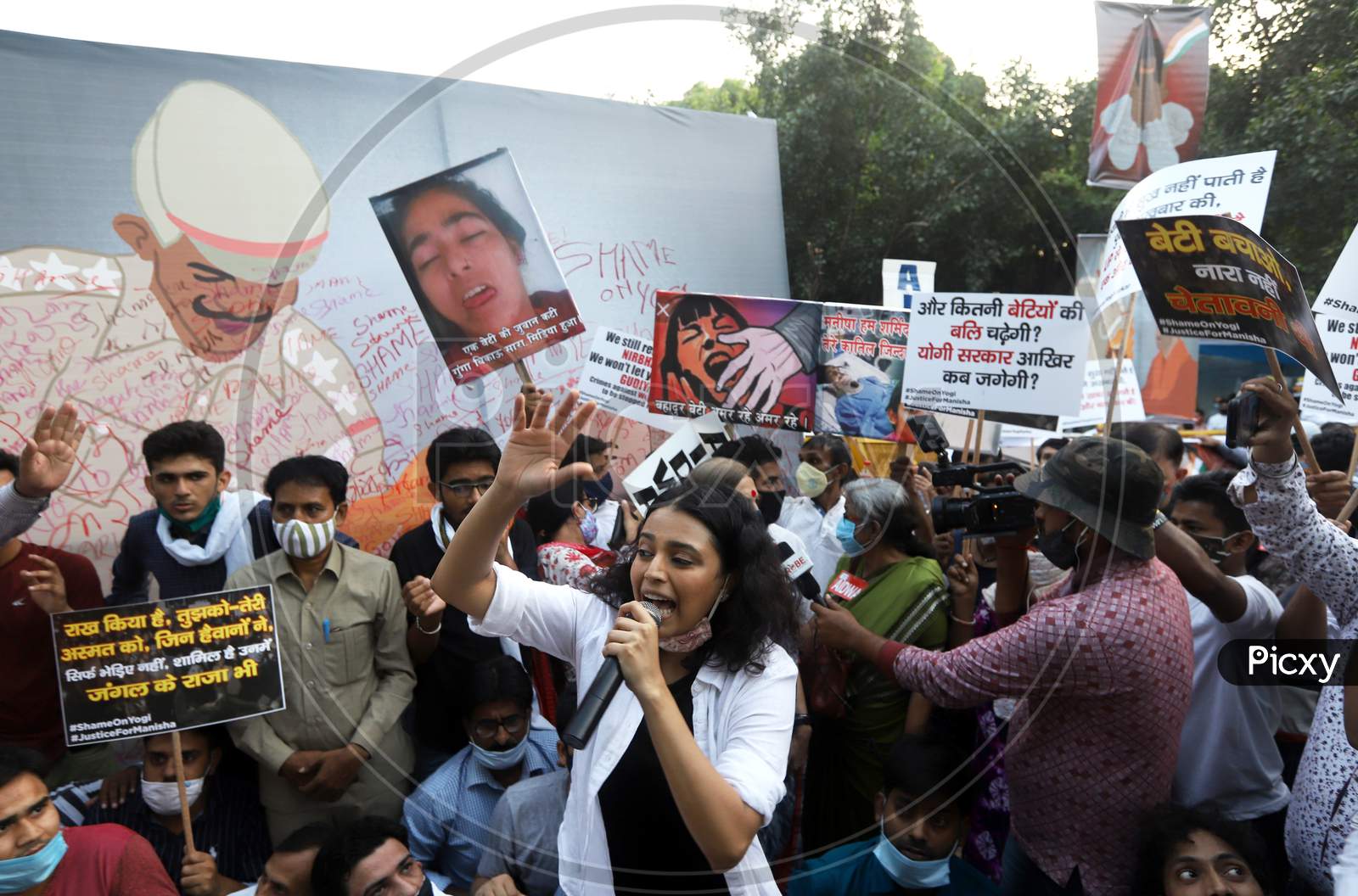 Bollywood actress Swara Bhaskar shouts slogan at the Citizen's protest to demand justice for Hathras victim, at Jantar Mantar, on October 2, 2020 in New Delhi, India.