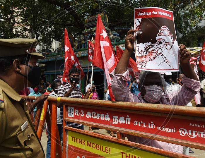 Communist Party of India (Marxist) activists stage a protest against the death of a 19-year-old woman in Hathras, in Chennai, Friday, Oct. 2,