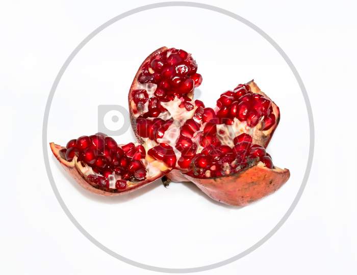 Fresh ripe pomegranate isolated on white background