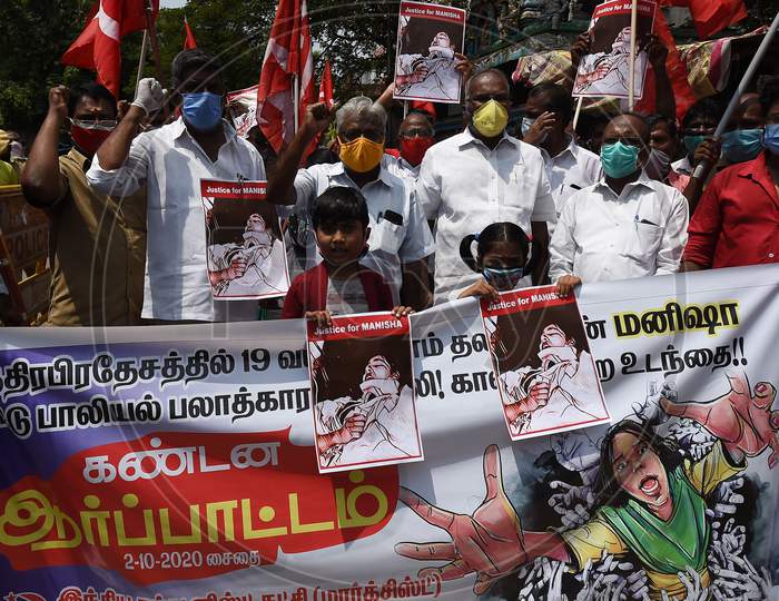 Communist Party of India (Marxist) activists stage a protest against the death of a 19-year-old woman in Hathras, in Chennai, Friday, Oct. 2,