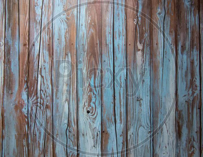 Blue colored weathered wooden background