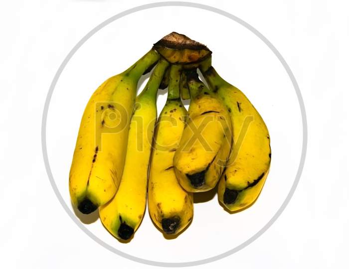 Bunch of yellow ripe banana on white background
