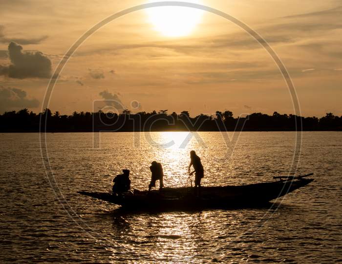 Fisherman Before Sunset