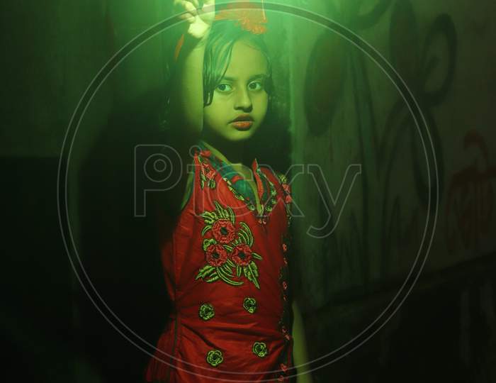Stock Photo Of Indian Little Girl Holding Sparkle Or Fire Cracker On