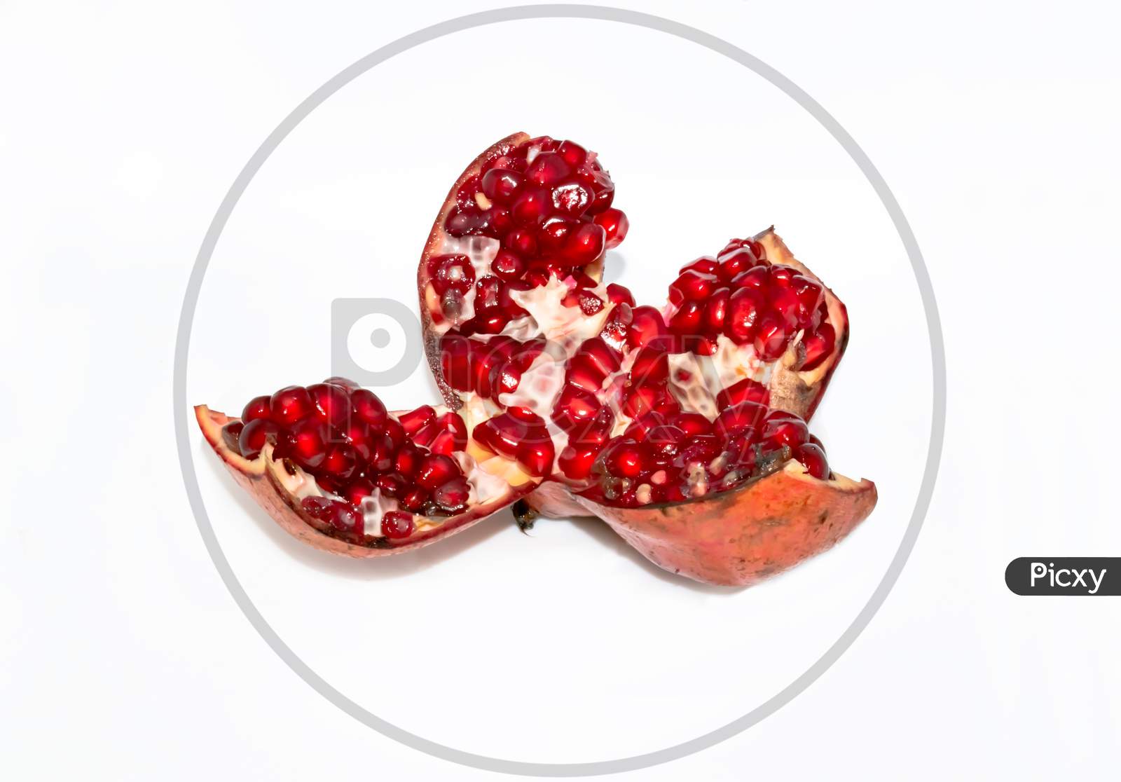 Fresh ripe pomegranate isolated on white background