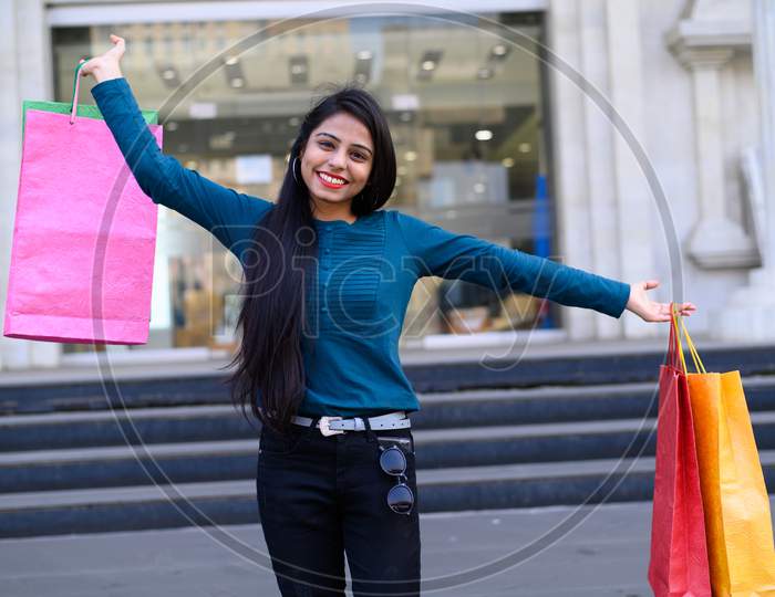 Indian young woman shopping