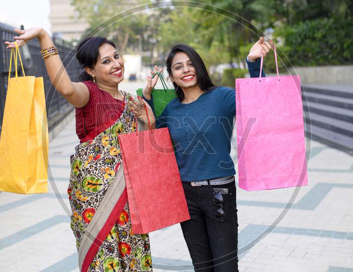 Mother and Daughter doing shopping