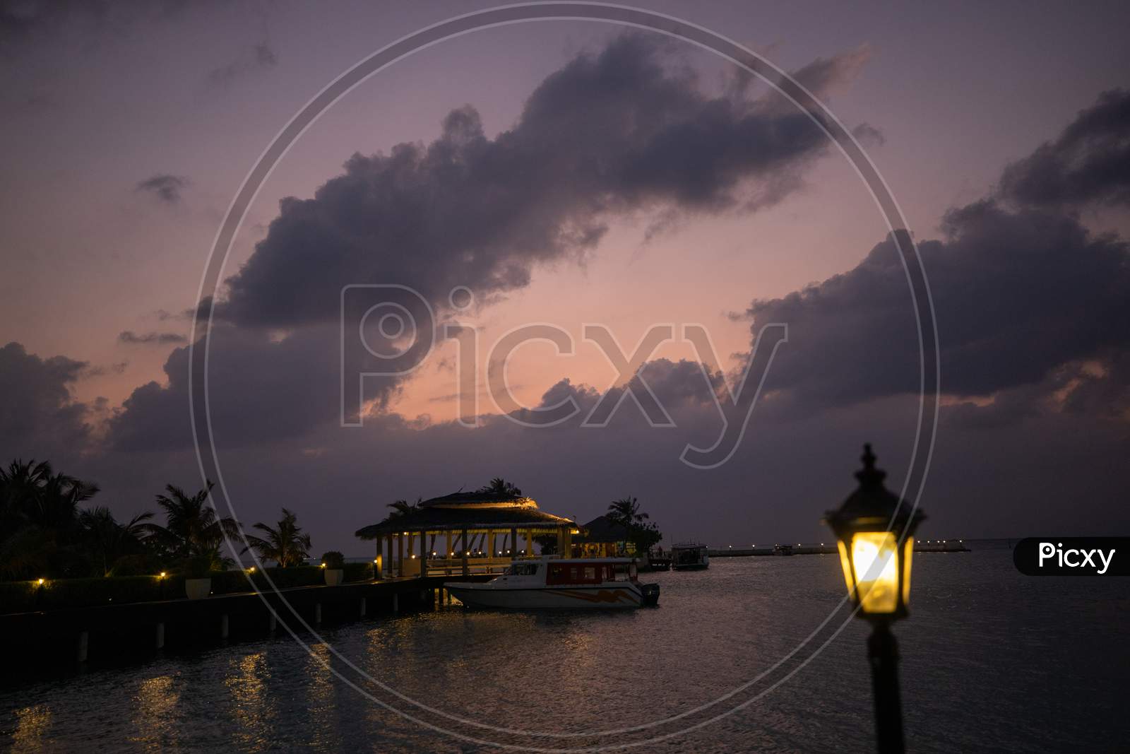 Huvafen Fushi Resort Maldives sunset time
