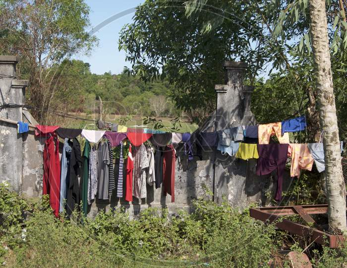 Colorful Clothes Hanging On A Washing Line In Cambodia