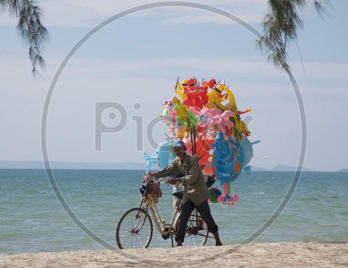 Typical Swimming Rings Vendor On Cambodia Beach In Sihanoukville