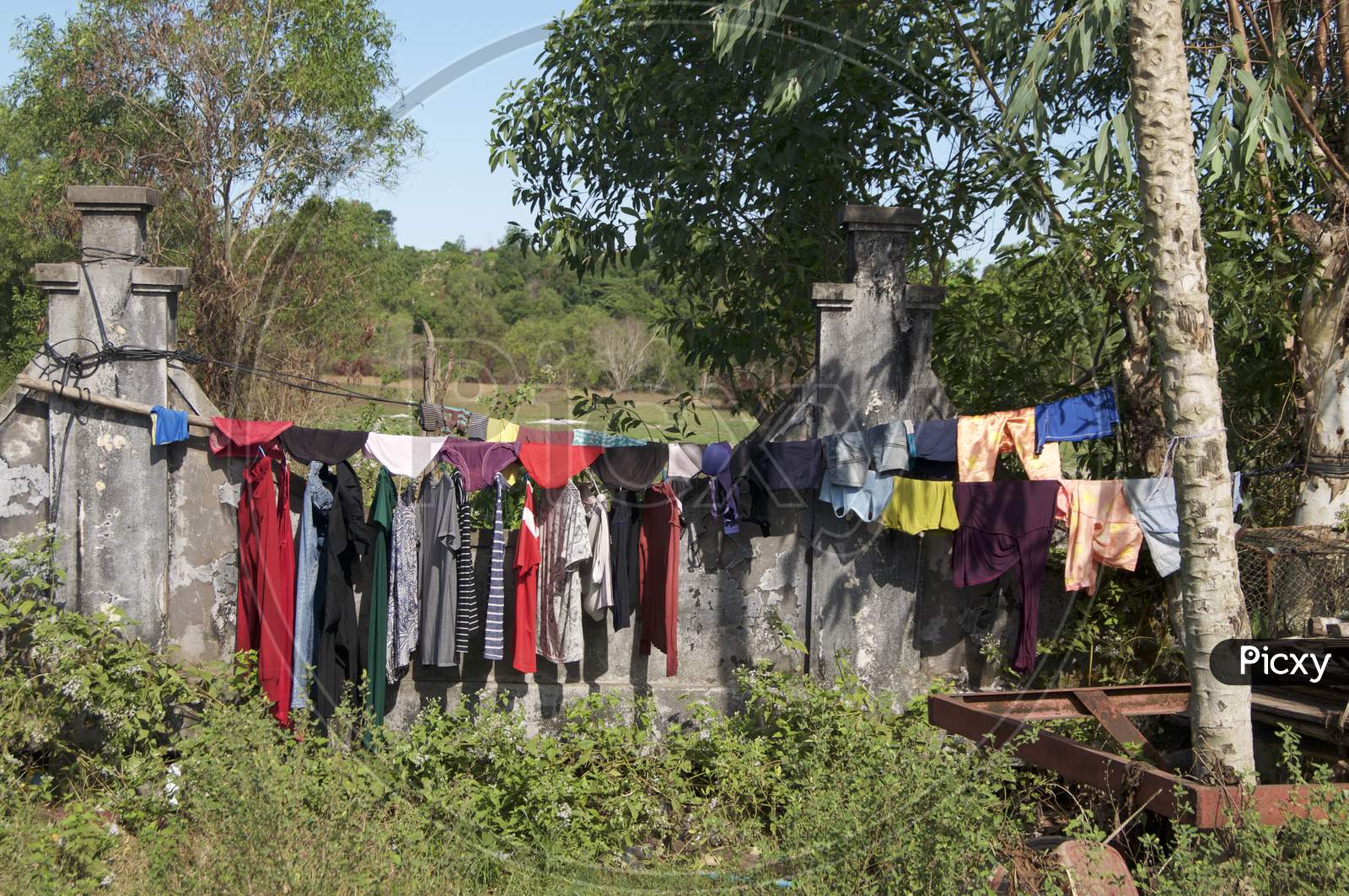 Colorful Clothes Hanging On A Washing Line In Cambodia