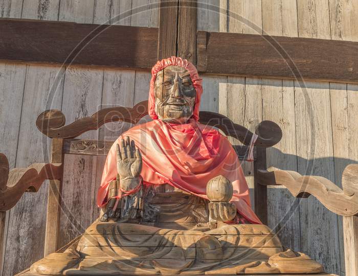 Wooden Statue Of Lord Buddha