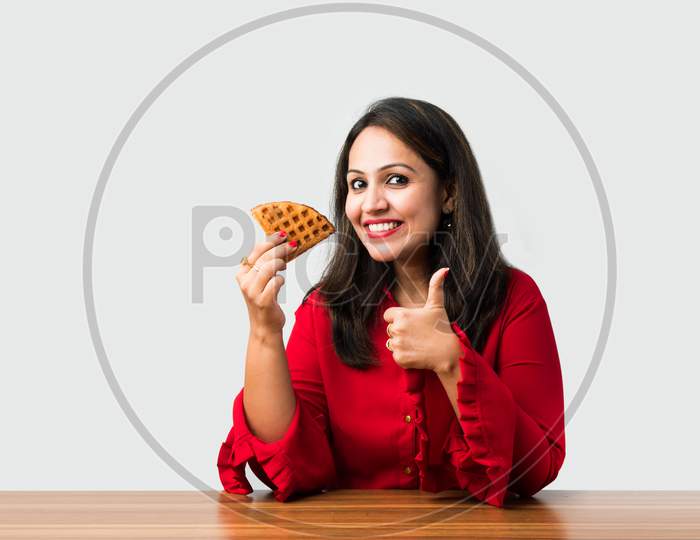Indian Asian Young Woman Eating Sweet Belgian Waffle
