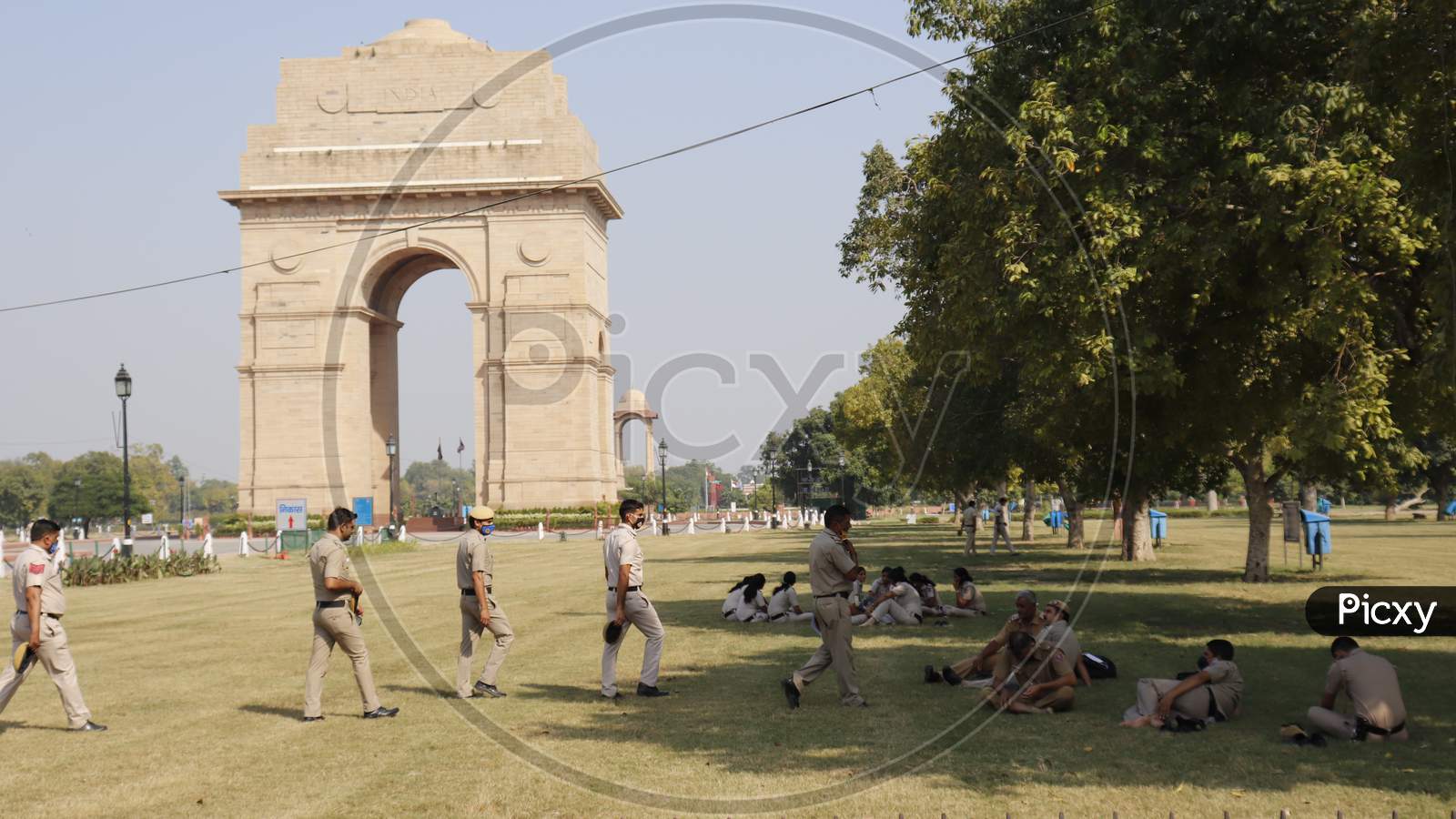 DELHI POLICE PERSONNEL RELAXING AT INDIA GATE DELHI, INDIA OCTOBER 2ND 2020
