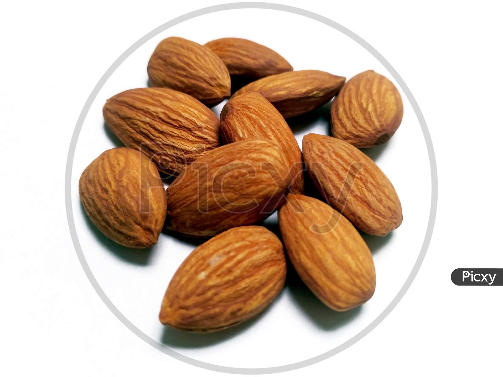 Closeup Shot Of Almonds On A White Background