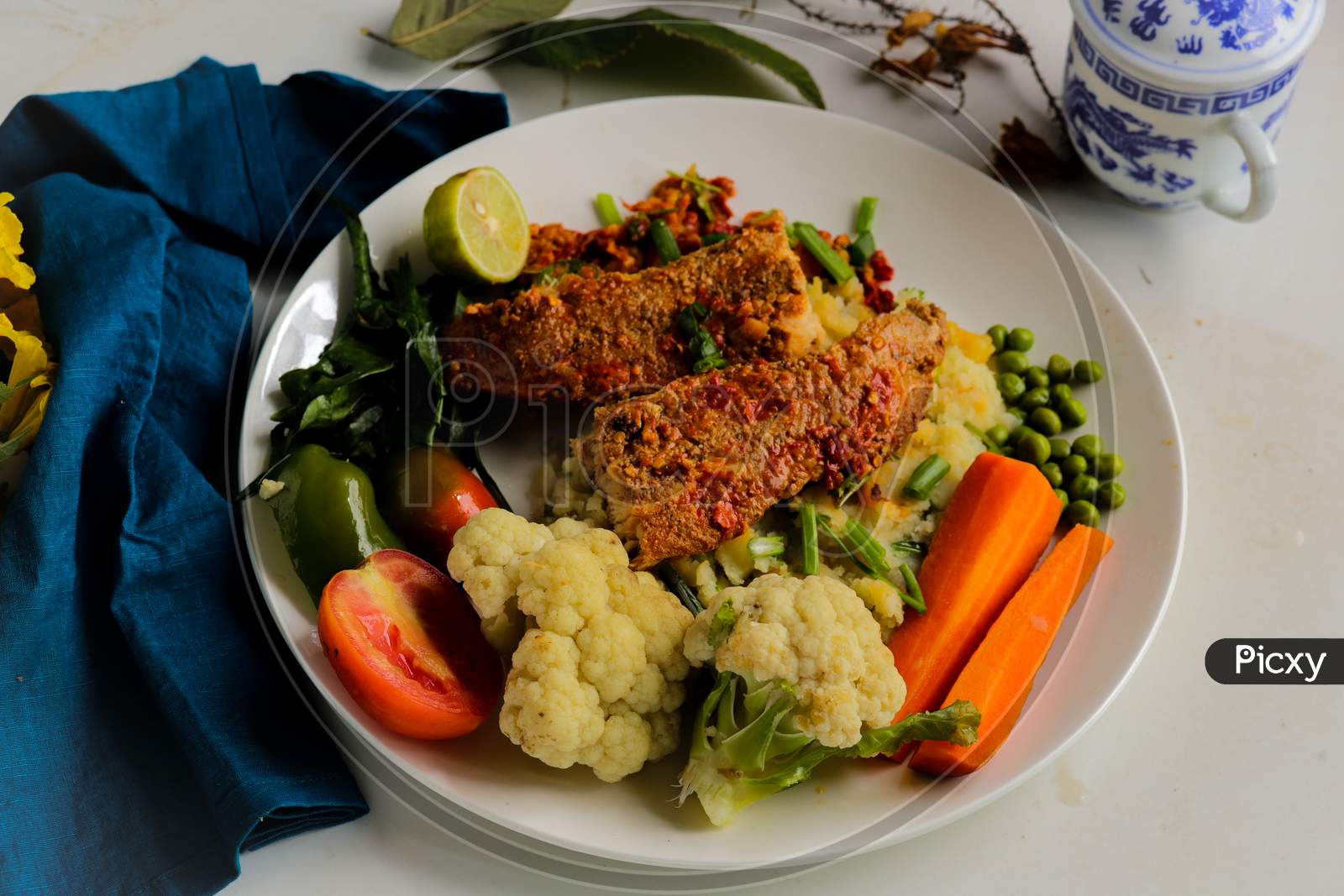 Basa sea fish fried with vegetables