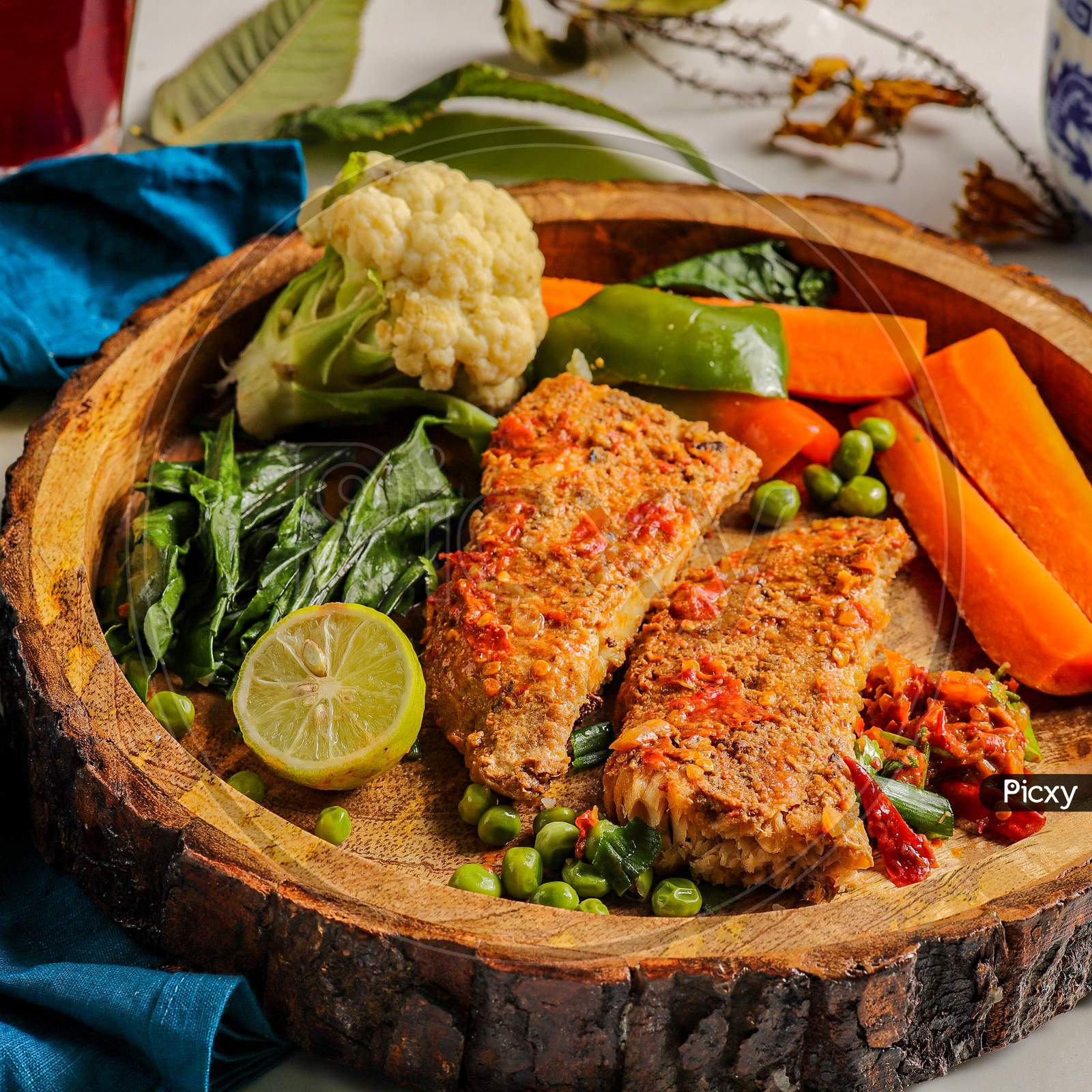 Basa sea fish fried with vegetables