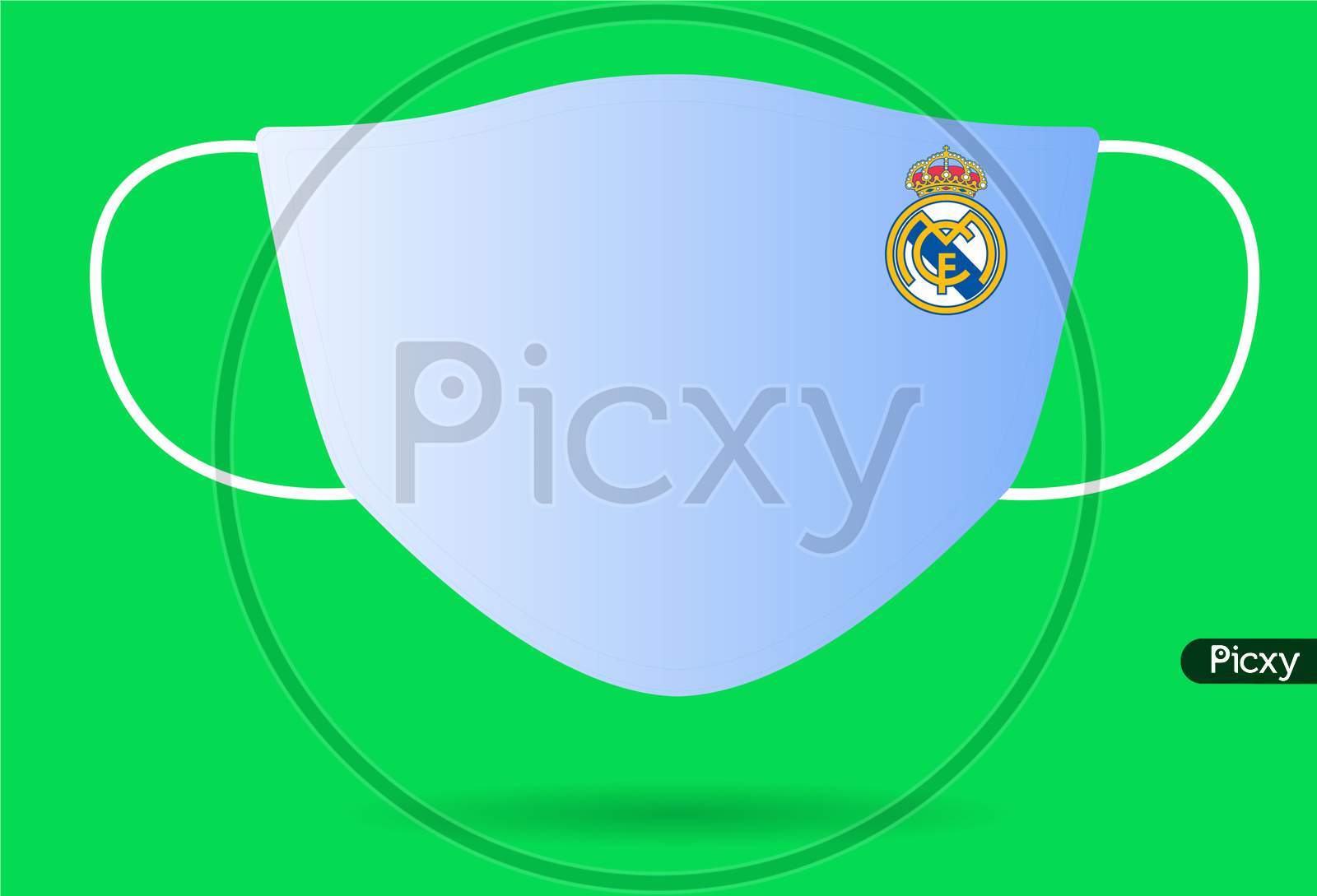 Madrid/Spain - August 21, 2020: Surgical Face Mask With Real Madrid Logo In Covid-19,Corona Virus Pandemic Isolated On Green Background.