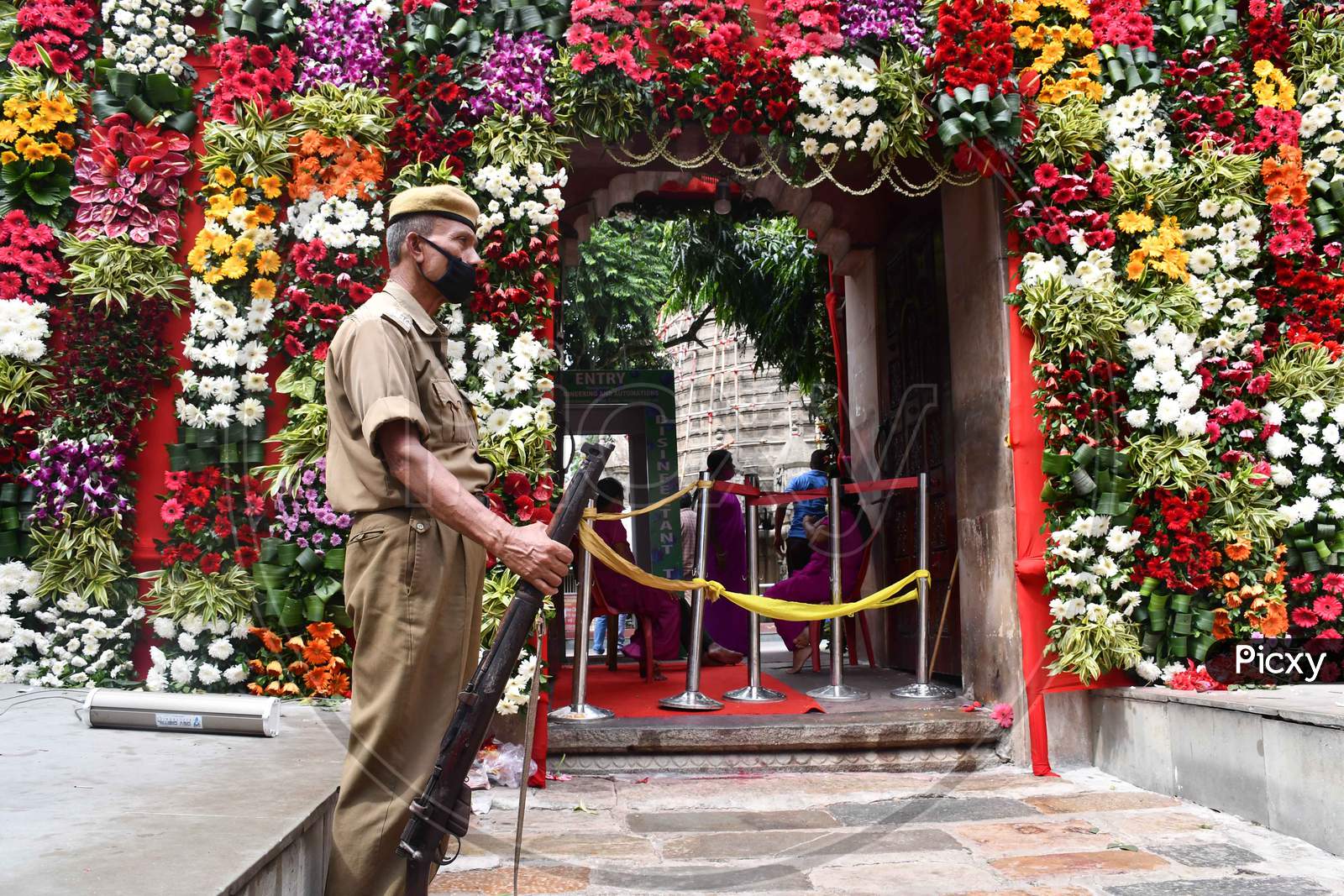 Security personal keep vigil outside the Kamakhya temple  on the occasion  of the Navratri festival, in Guwahati on Oct 22,2020.