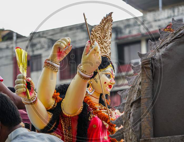 Image Of The Great Fort Festival Of Hinduism. Image Of Goddess Durga. It Is A Sculpture Made By The Artist. The Goddess Is Taken Away For Abandonment.