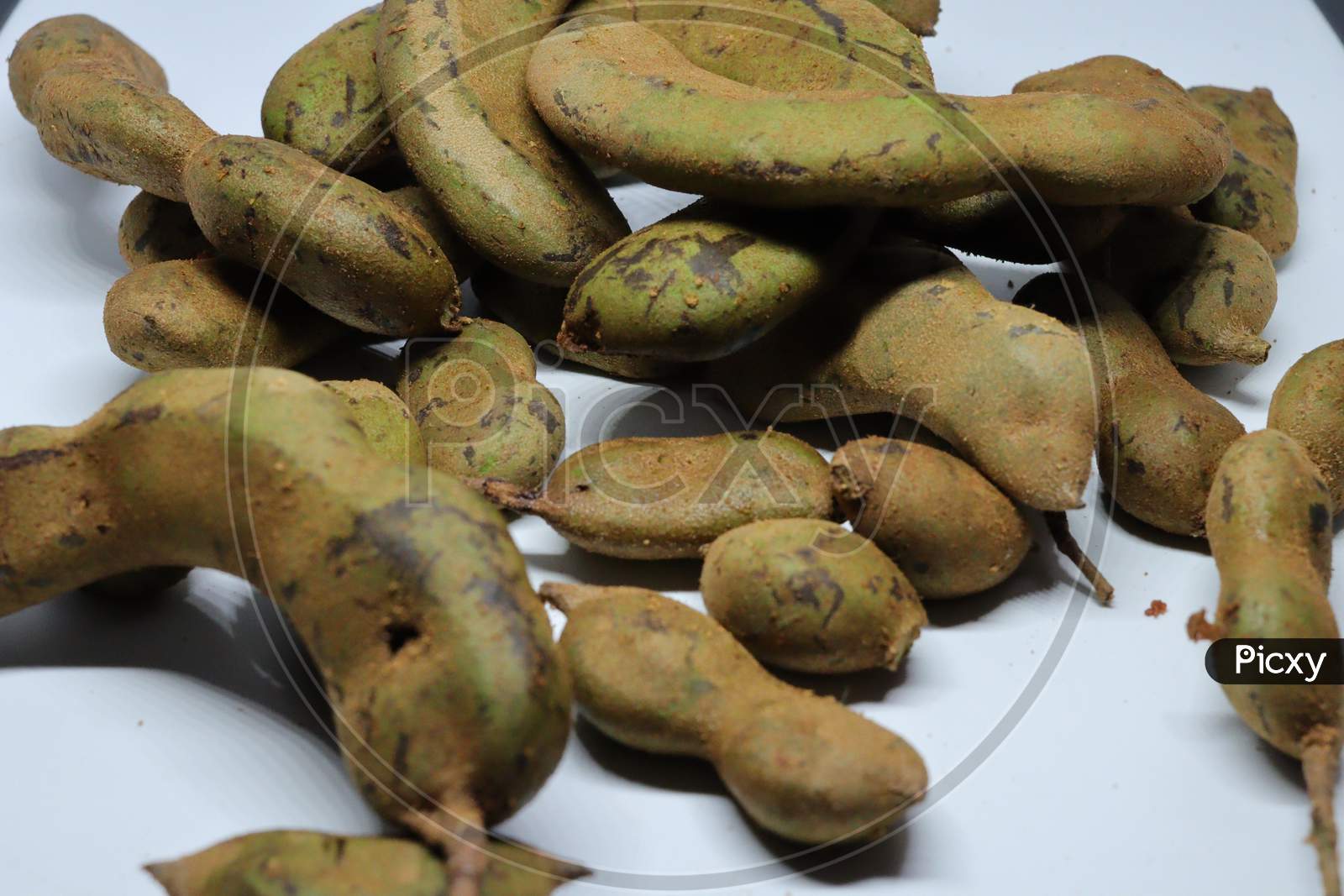 Image Of Fresh Young Green Tamarind Tamarindus Indica Isolated On White Background Uo Picxy